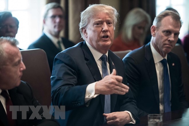 Tổng thống Mỹ Donald Trump - giữa. (Ảnh: AFP/TTXVN)