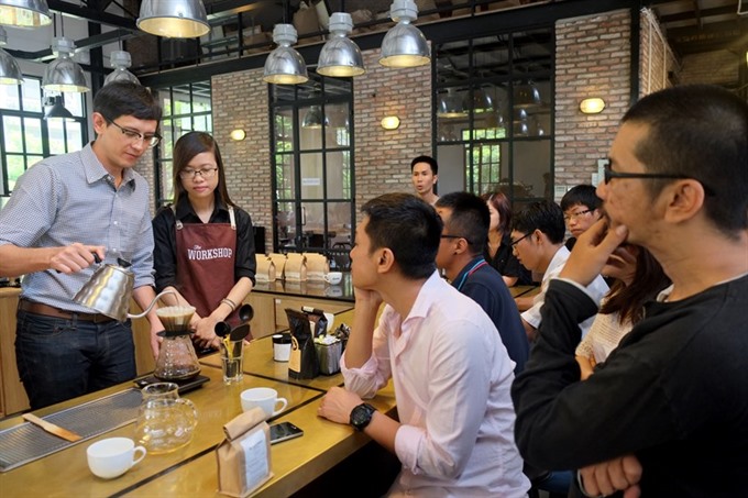 Coffee master: Will Frith (front left) focused mostly on roaster and barista training, branding, quality control and product development. — Photos courtesy of Will Frith Read more at http://vietnamnews.vn/life-style/426118/vietnamese-coffee-inspires-american-coffee-geek.html#cxZF4FXwIBEAwLI6.99