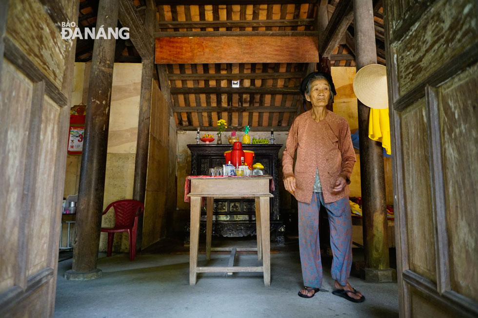 Ms Mang is third-generation descendant living in this ancient house which is used to worship the Ong Family  