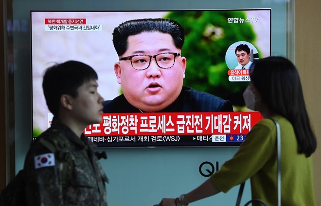 News screen showing a file footage of DPRK leader Kim Jong-un (Photo: AFP)