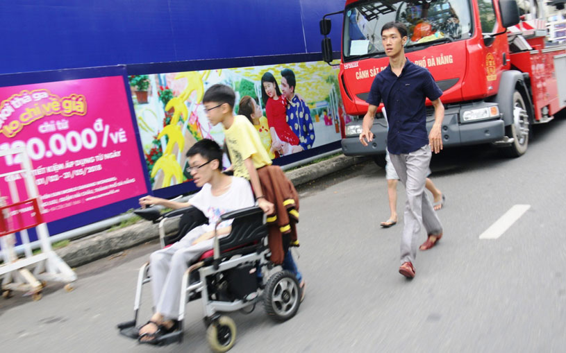 A disabled resident approaching to a fireworks viewing stand