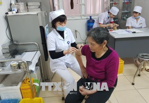 A woman got vaccinated at Diseases Control Centre in Thai Nguyen after being bitten by a dog.