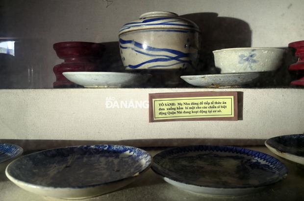 Currently on display at the house are numerous artifacts relating to Mother Nhu and the 7 Thanh Khe heroes. This image features porcelain bowls which Mother Nhu served rice for Thanh Khe heroes.