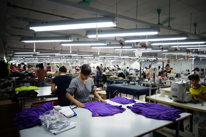 For goods exported or imported under special permits, firms can only sign the processing contracts for foreign traders once they receive licences from the Ministry of Industry and Trade. — VNS Photo Phương Thảo Read more at http://vietnamnews.vn/economy/448655/new-rules-on-processing-goods-for-foreign-traders.html#gQqGwreSDYkHs9iW.99