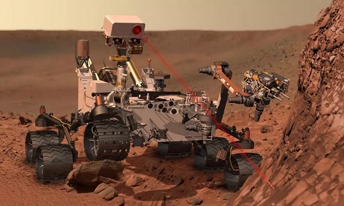 Robot Cusiosity khoan xuống bề mặt sao Hỏa để lấy mẫu vật hôm 20/5. Ảnh minh họa: Cover Image.