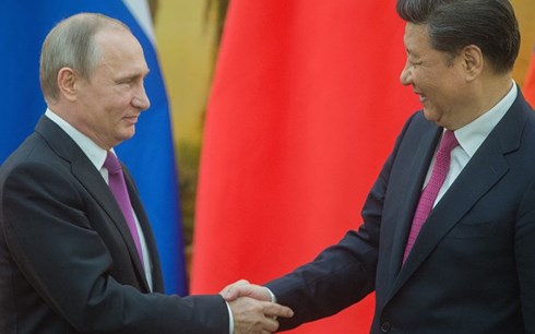 Tổng thống Nga Putin (trái) và Chủ tịch Trung Quốc Tập Cận Bình (phải). Ảnh: Sputnik