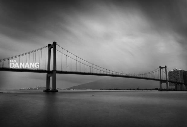 … the Thuan Phuoc Suspension Bridge in thunderstorm