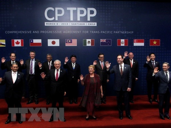 Representatives of CPTPP members at the signing ceremony in Chile last March (Photo: AFP/VNA)