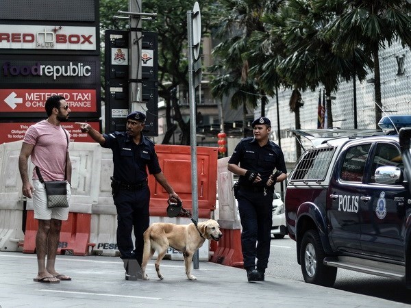 Malaysian police patrol on Bangkok street (Source: AFP/VNA)