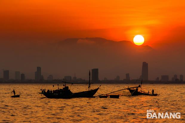 The sparking image of the city in soft golden twilight