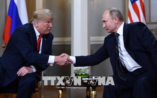 Tổng thống Nga Vladimir Putin (phải) và Tổng thống Mỹ Donald Trump trong cuộc gặp thượng đỉnh tại Helsinki, Phần Lan ngày 16/7. Ảnh: AFP/ TTXVN