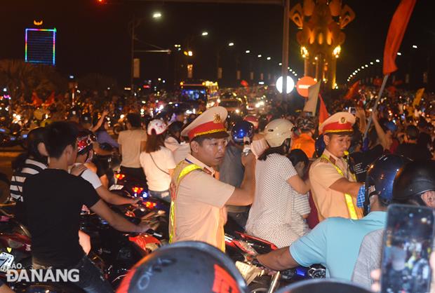 Police officers being on duty to ensure traffic order and safety in the city