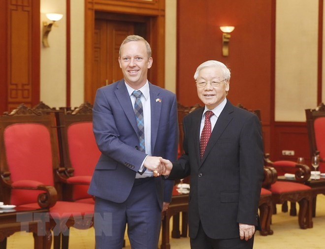 General Secretary of the Communist Party of Vietnam Nguyen Phu Trong (R) and UK newly-accredited Ambassador to Viet Nam Gareth Ward