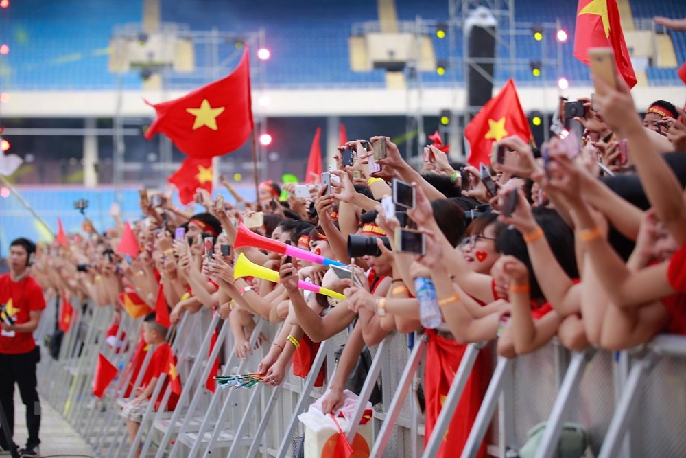 Người hâm mộ có mặt trên khán đài sân vận động Mỹ Đình để cổ vũ cho đoàn Thể thao Việt Nam. (Ảnh: Trọng Đạt/TTXVN)