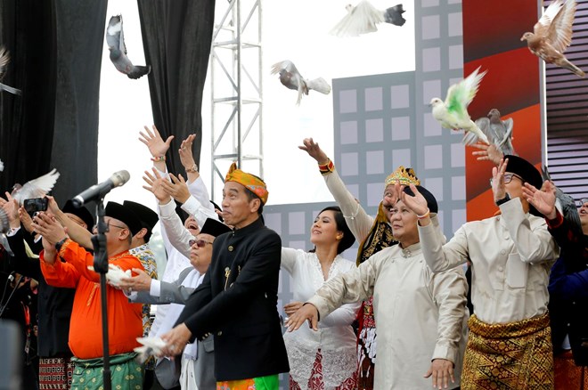 President Joko Widodo (second from left) (Source: AP) 