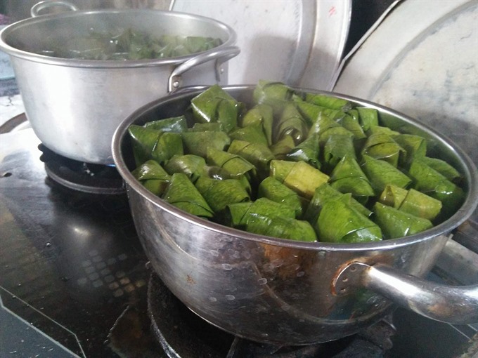 In progress: Nguyễn Thị Vui boils her dumplings. Read more at http://vietnamnews.vn/life-style/466317/steamed-dumplings-show-viet-nams-history.html#tOjUEbf52op3Y5w4.99