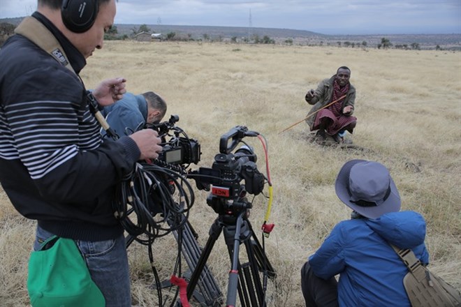 Filmmakers for Discovery Channel on a shoot in Africa.