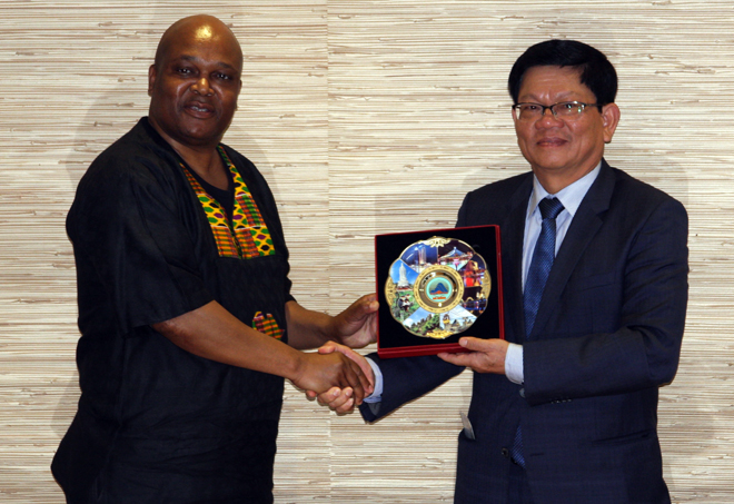 Deputy Secretary Tri (right) and Mr Medileke Ramushu 