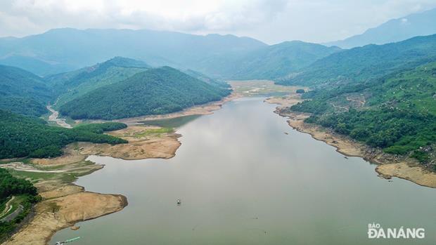 An overview of the Dong Xanh-Dong Nghe Lake from above. According to the locals, Dong Xanh and Dong Nghe are separated by a horizontal slot. Dong Nghe is from the slot and below, whilst Dong Xanh is from the slot and above.