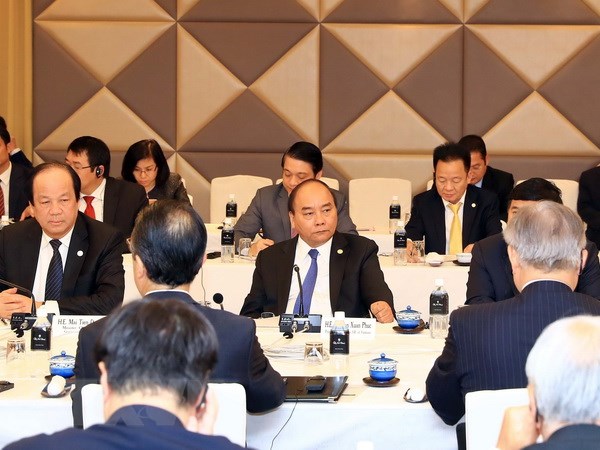 Thủ tướng Nguyễn Xuân Phúc dự Tọa đàm bàn tròn với các doanh nghiệp lớn của Nhật Bản. (Ảnh: Thống Nhất/TTXVN)
