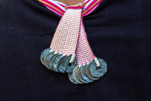 The Dao Tien are so called because they use coins to decorate their traditional clothing.