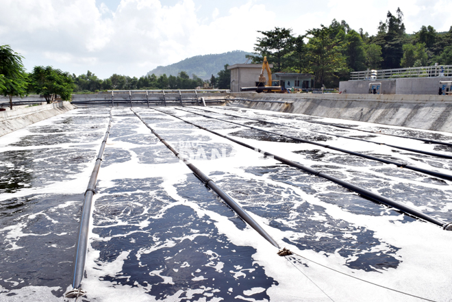 Already-collected leachate flowing into biological treatment ponds