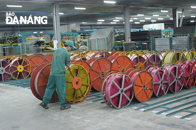 A worker at the Da Nang Rubber Company