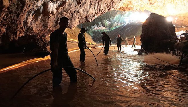 Rescuers worked on a plan to extract 12 boys and their soccer coach trapped inside the Tham Luang Nang Non cave, Chiang Rai province, Thailand, in summer 2018. (Photo: thenews.com.pk)