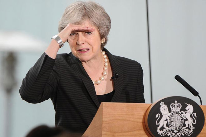 Thủ tướng Anh Theresa May kiên quyết bảo vệ thỏa thuận Brexit.Ảnh: Reuters 