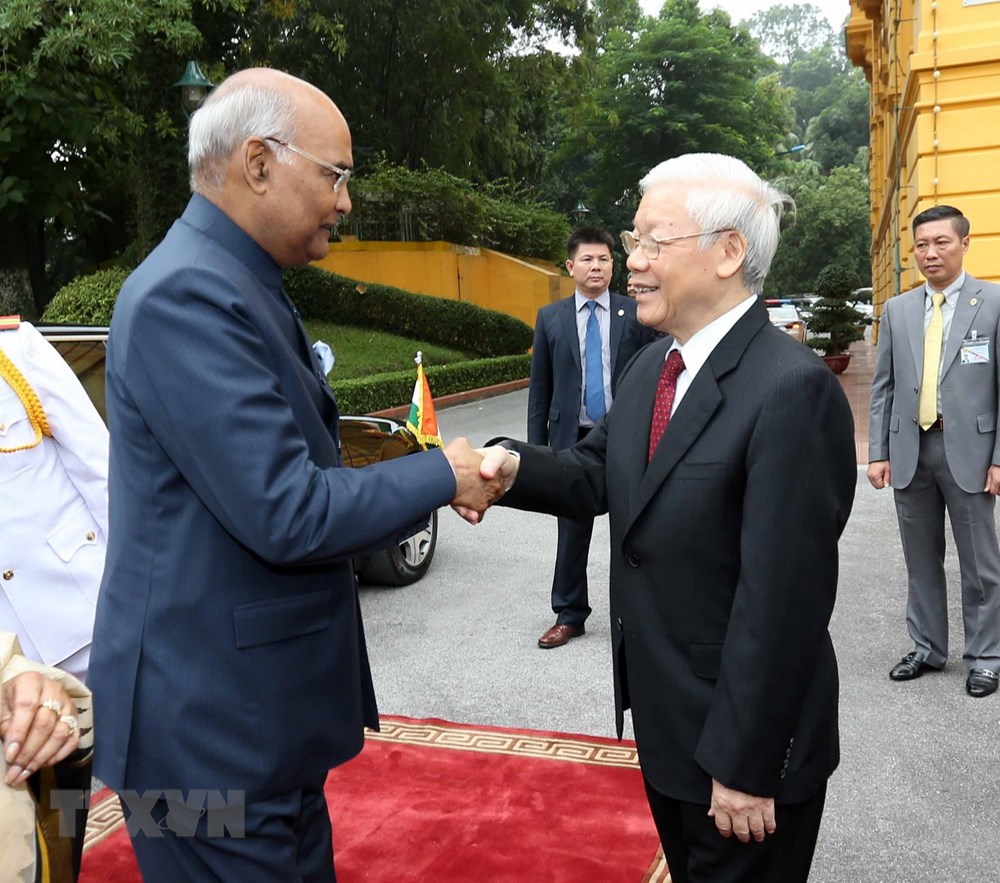 Tổng Bí thư, Chủ tịch nước Nguyễn Phú Trọng đón Tổng thống Ấn Độ Ram Nath Kovind. (Ảnh: Trí Dũng/TTXVN)