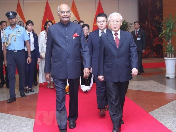 General Secretary of the Communist Party of Vietnam Central Committee (CPVCC) and President Nguyen Phu Trong (R) and Indian President Ram Nath Kovind 