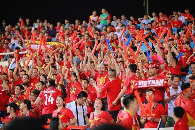 Fans fill up the My Dinh National Stadium in Hanoi at the match between Vietnam and Malaysia on November 16