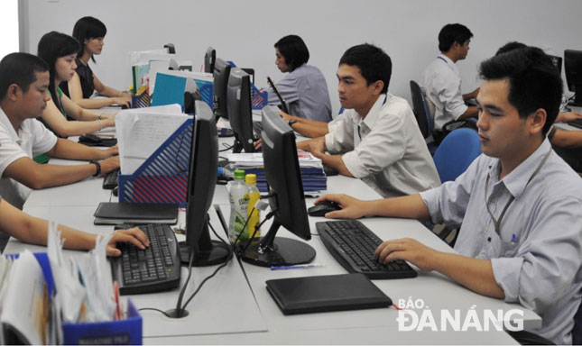 Employees at the city-based United Technologies Corporation are pictured being at work