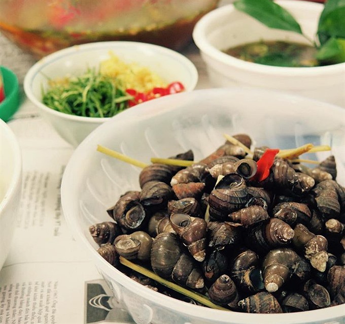 Snails, a popular dish among Vietnamese diners, still seems to be exotic for foreign foodies, but was among the top 21 dishes of 2018. — VNS Photo Hồng Vân Read more at http://vietnamnews.vn/life-style/480799/three-vietnamese-treats-among-top-dishes-of-2018.html#uZoEg6XA2efgzPcp.99