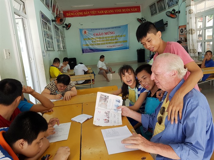Reading: Matthew Keenan (front right) with the children at DAVA’s day care centre. Courtesy Photos of Matthew Keenan Read more at http://vietnamnews.vn/life-style/expat-corner/481412/american-vet-finds-peaceful-home-in-da-nang.html#7TkySf5ACT6xpY76.99