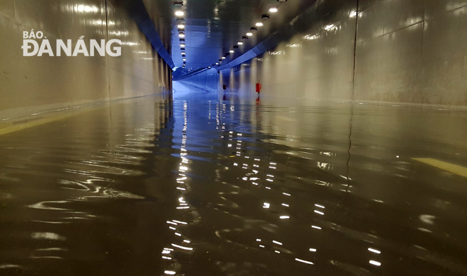 The Dien Bien Phu road tunnel being heavily submerged in rainwater