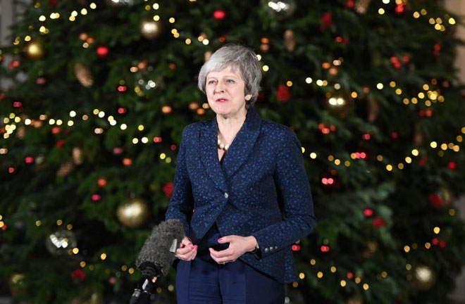 Thủ tướng Theresa May đối mặt với “cuộc chiến” tại Quốc hội để bảo vệ thỏa thuận Brexit. 						            Ảnh: Evening Standard