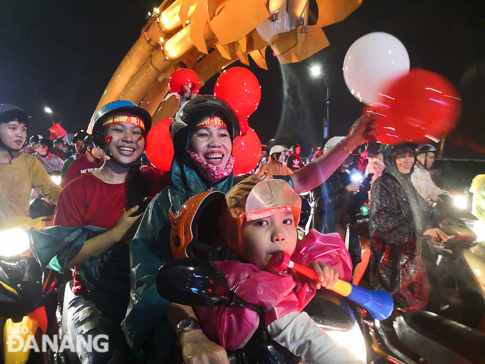  Children with their parents joining the street celebrations.