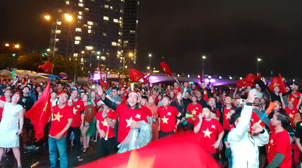 All fans exploding into joy after first AFF Cup championship in decade, loudly chanting “Viet Nam” with their deep pride in the talented Vietnamese players....