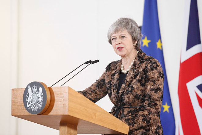 Thủ tướng Anh Theresa May đối mặt với sự chia rẽ trong Quốc hội chung quanh thỏa thuận Brexit. Ảnh: PA
