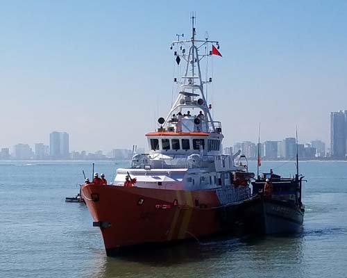 Fishing boat DNa 90364 TS being towed by rescue ship SAR 412 back to the mainland