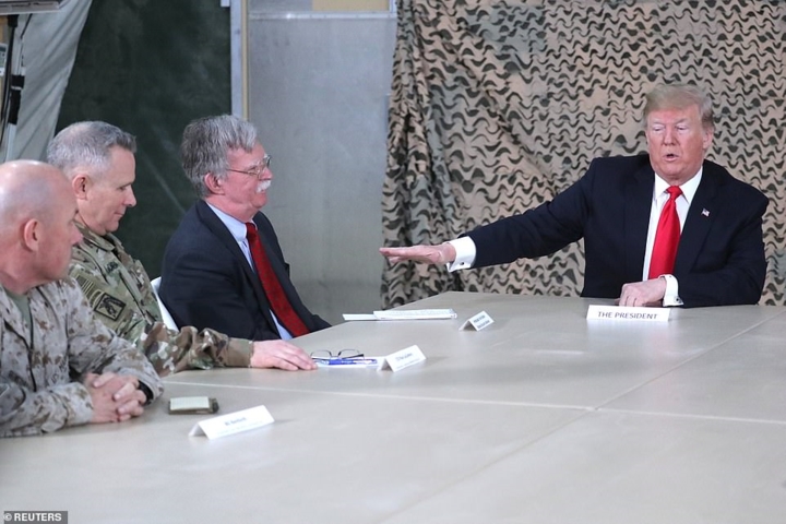 Tháp tùng ông Trump và Phu nhân trong chuyến thăm lần này còn có Cố vấn An ninh Quốc gia John Bolton. Ảnh: Reuters.