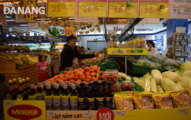 Various types of Tet products being displayed at the Co.op Mart 