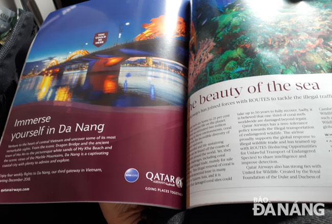 Hình ảnh cầu Rồng (Đà Nẵng) xuất hiện trên tạp chí hàng không của Hãng hàng không Qatar. Ảnh: T.VÂN