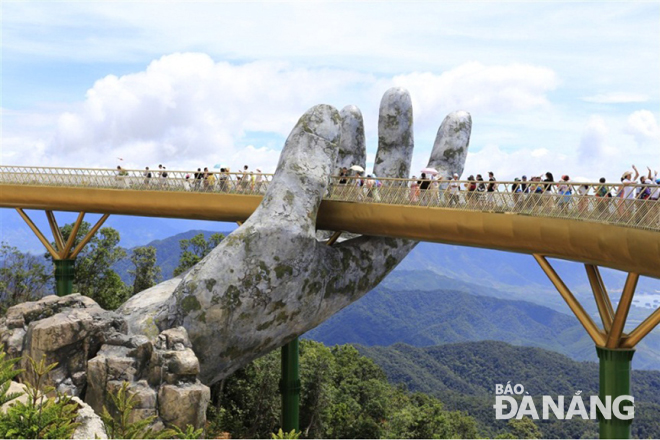 The Cau Vang (Golden Bridge) on the top of the Ba Na Hills has been very inviting to visitors from both home and abroad.