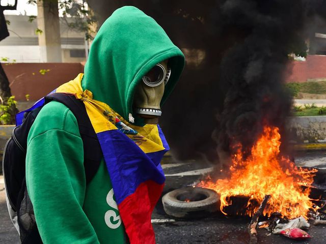 Người biểu tình tại thủ đô Caracas của Venezuela. (Ảnh: Getty)