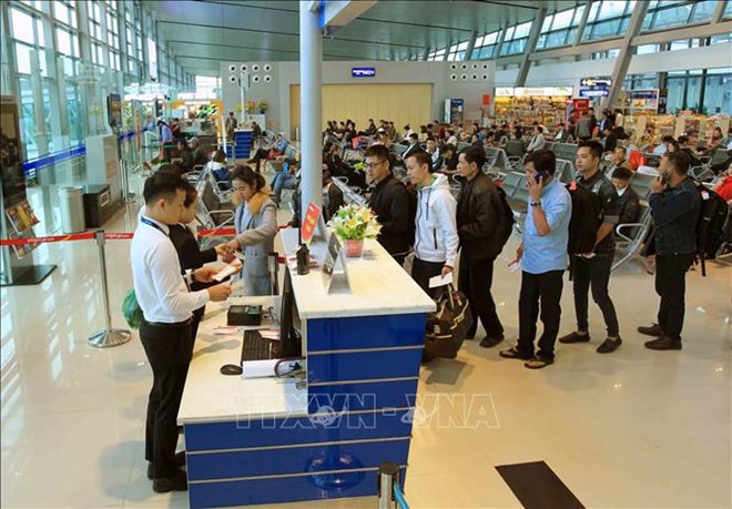 At an airport (Source: VNA)