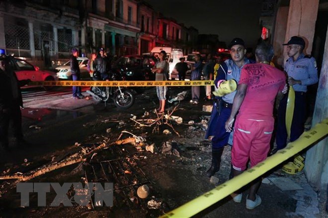 The powerful tornado passed through the Cuban capital of Havana, leaving severe damage to the city. (Photo: AFP/VNA)