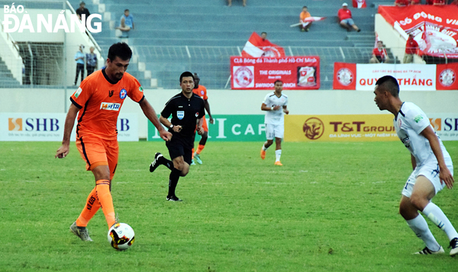 Do Merlo (in orange) is expected to be football star under the instruction of coach Duc.