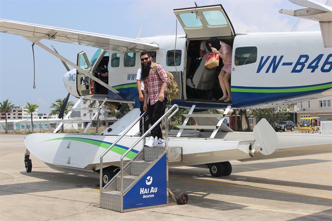 A seaplane of Hải Âu Aviation carries tourists to destinations in Việt Nam. The airline plans to launch its new sightseeing trips between Đà Nẵng and Huế in April. — VNS Photo Công Thành Read more at http://vietnamnews.vn/life-style/505678/hue-da-nang-seaplane-sightseeing-tours-to-launch-in-april.html#6AX6B3xzeTJ3A0So.99